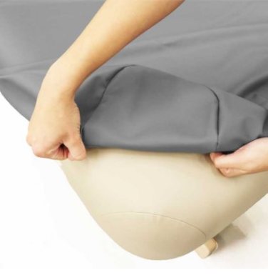 Housse en vinyle ajustée pour table de massage (coin rond uniquement)